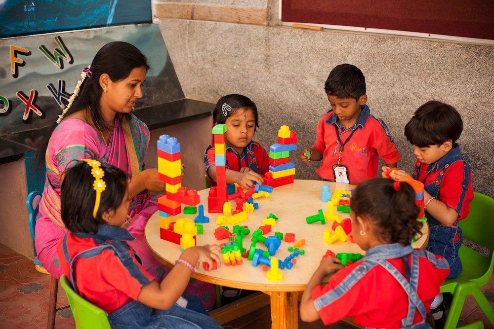 Kids Play students building with blocks